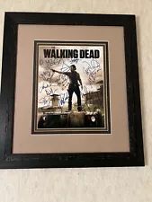 Walking Dead original signed bill. Framed and matted.