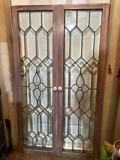 TWO STAINED LEADED BEVELED GLASS DOORS 16 3/4" x 58 3/4" EACH