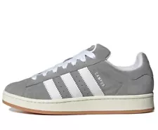 brown and white adidas