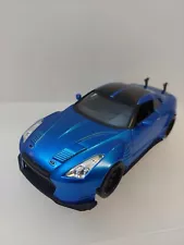 JADA TOYS FAST AND FURIOUS BRIANS 1999 NISSAN GT-R R35 MODEL CAR SCALE 1/24