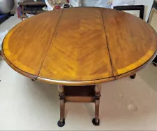 HARDWOOD ROUND TABLE 67” Wide Sides Lower To 26” Wide LOCAL PICKUP