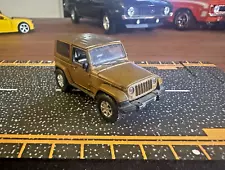 GREENLIGHT 2011 JEEP WRANGLER 70th ANNIVERSARY DIECAST LIMITED EDITION GOLD MINT