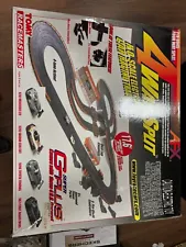 4 Lane G plus Tomy AFX slot car racing tracks.