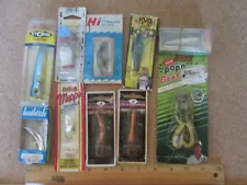 Lot 137 - 10 fishing lure lures out of old tackle box ( new)