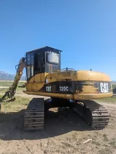 Cat 320c LL Log Loader Harvester Processor Waratah logging forestry equipment