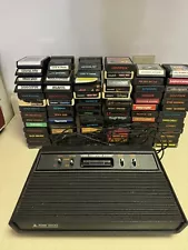 Atari 2600 System Bundle with Console, 81 Games, Joysticks, Paddles, and More!!!