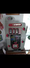 antique quarter slot machine with stand for sale