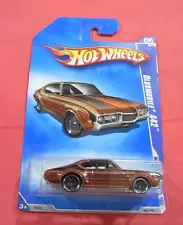 2009 HOT WHEELS OLDSMOBILE 442 MUSCLE MANIA #082 BROWN