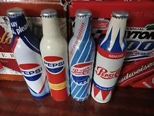 THIS SALE IS FOR 4 FULL ALUMINUM SODA BOTTLES BY PEPSI FROM THE RETRO SERIES