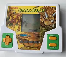 Vintage Tiger Electronic Dinosaurs! 1992 handheld LCD Game