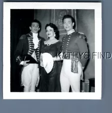 FOUND B&W PHOTO T_0353 PRETTY WOMAN IN DRESS POSED WITH MEN IN COSTUMES