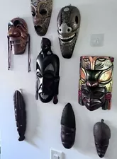 8 collection Of handmade wooden mask From All Over The Globe