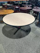 54"x29"H round conference table in Beige laminate top w/ Black trim by Steelcase