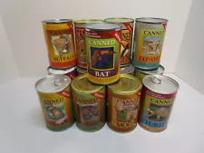 12 Canned Critters/3 Aussie Cans/2 Grizzly Cans 17 Total All New & Sealed In Can