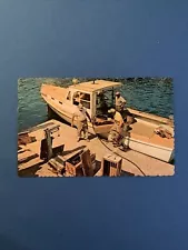 Lobster Boat Unloading Lobsters for Weighing in Maine