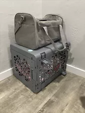 Dog Crate, carrying bag, Pink bed, and clothes. ( All made for a small dog).