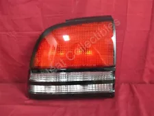 NOS OEM Oldsmobile Cutlass Supreme 4-Door Sedan Tail Light 1992 - 97 Left Hand (For: 1997 Cutlass Supreme)