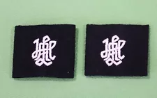 Pair of German World War II Leibstandarte AH Shoulder Board Cyphers