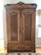 Antique Tiger Oak Armoire - Carved with beautiful grain and detailing.