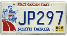 *99 CENT SALE* 1988 North Dakota TEDDY ROOSEVELT License Plate #JP297 No Reserve