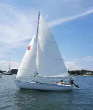 fiberglass sailboat for sale with extra sails, 2.6hp outboard, trailer, + extras