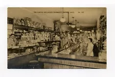 Amherst MA postcard, Wellworth Pharmacy, staff at soda fountain, goods for sale