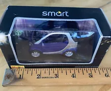 Maisto Smart Car Motorized 1:33 scale die cast model Blue & Silver With Box