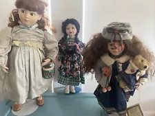 Lot of Vintage collectable porcelain dolls for sale.