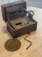 Small phonograph portable motor (motor turns smoothly) for parts or rebuild