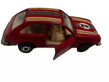 Chevy Chevette 1982 by Yatming die cast #7 doors open