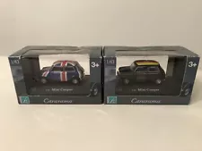 Cararama Mini Cooper 1/43 scale - Two models. British and German flags on roof