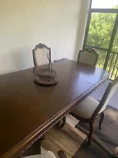 Large solid wood dinning room table chairs Included *PRICES NEGOTIABLE