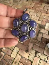 Tanzanite and diamonds sterling silver pendant