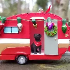 Red Teardrop camper with adorable puppy