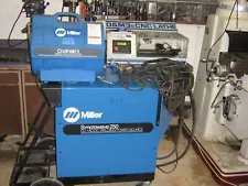 miller 250 synchrowave tig welder. very good. forklift onsite