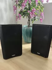 Pair of QSC K12 Powered Speakers with bags & stands