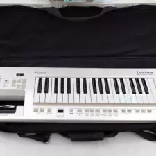 (Free shipping) Roland AX-09 Lucina 37-Key Synthesizer used