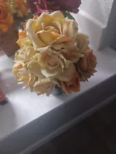 Cream and orange rose flower arrangement