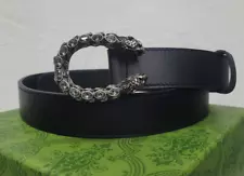 Gucci black belt with signature style buckle with stones