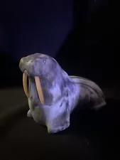 And carved walrus with tusks from Canada