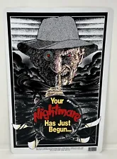 1989 FREDDY KRUEGER "YOUR NIGHTMARE HAS JUST BEGUN..." PLASTIC WALL HANG 11"x17"