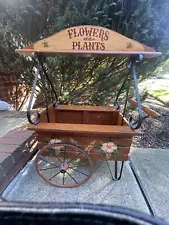 vintage wooden wagon flowers and plants 33”