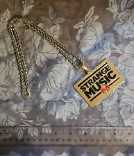 Strange Music Silver Tone Chain and Pendant Necklace