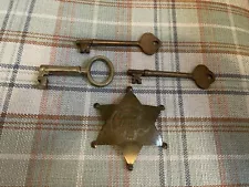 Vintage Sheriff Badge and Jailer Keys.