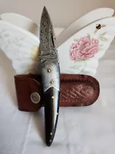 Damascus handmade folding knife With Horn Handle and Sheath