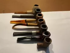 SIX SMOKING PIPES AND ONE METAL WITH NO STEM & NONE HAVE MAKERS MARKS