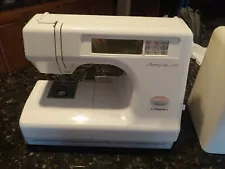 Janome Memory Craft 8000 sewing and embroidery machine