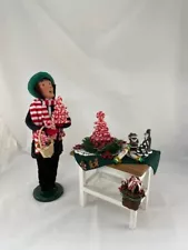 Byers Choice LTD Man Selling Candy Canes with table of Christmas items for Sale