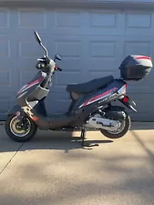 Moped scooter 50cc used, red and black, newer condition