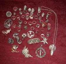 1 pound of sterling silver mixed jewelry, rings, broaches, a nice assortment